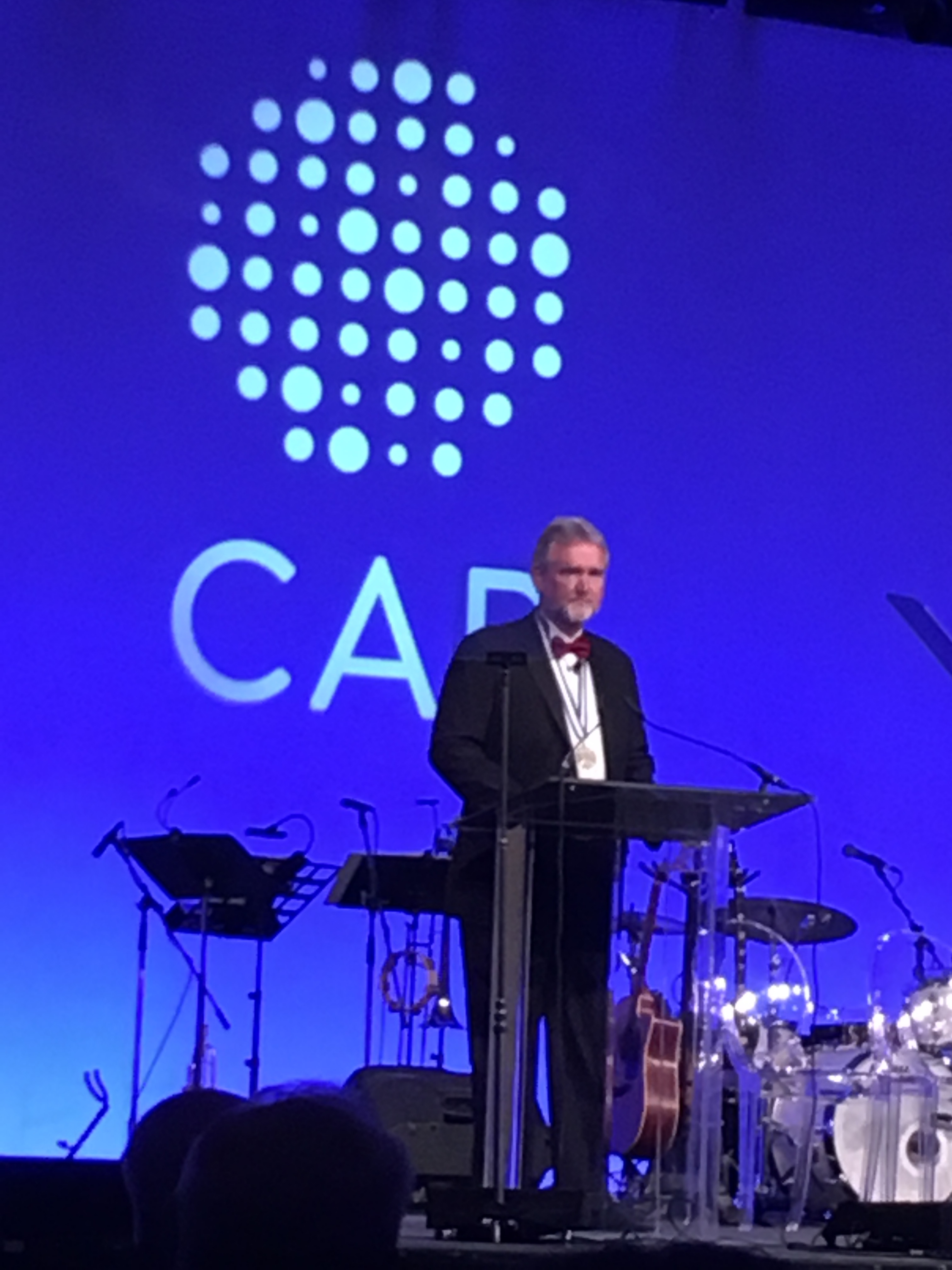 Dr. Herbek at a CAP lectern
